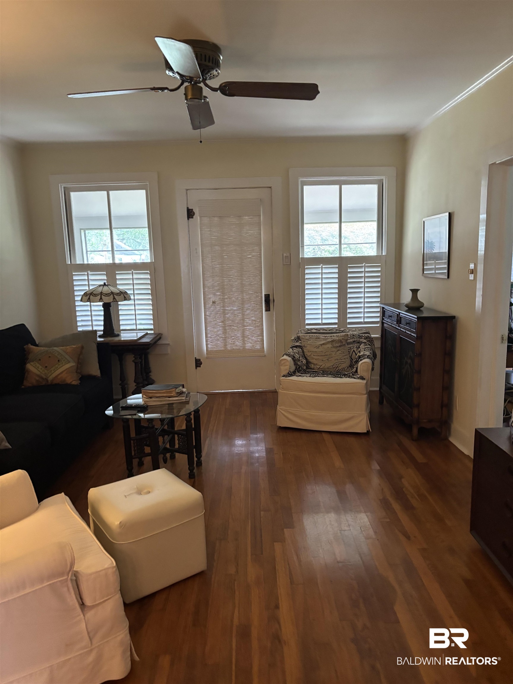 216 West Orange Avenue Foley, AL 36535 - Photo 32 of 37 Living room featuring plenty of natural light, ceiling fan, and hardwood / wood-style flooring