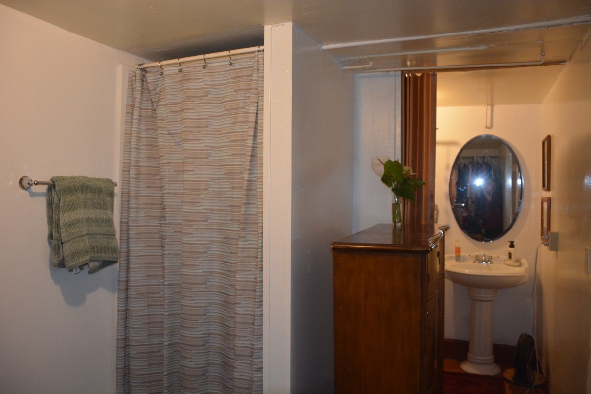 3917 Koula Road, Unit 2 Hanapepe, HI 96716 - Photo 14 of 21 a bathroom with a shower and a mirror