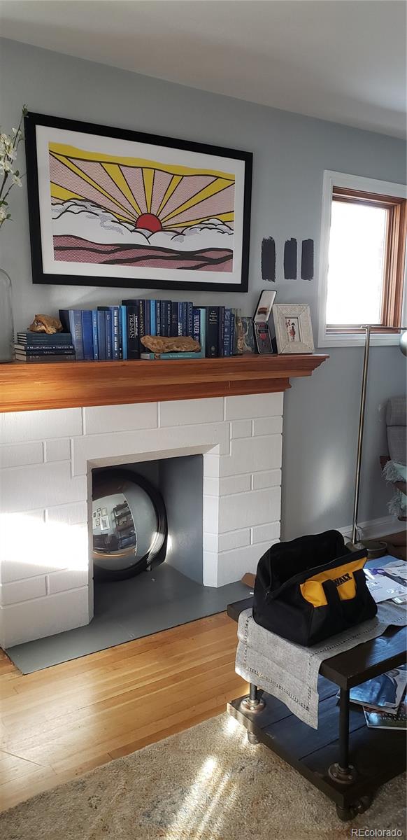 1644 Race Street Denver, CO 80206 - Photo 1 of 6 a living room with furniture pool table and a window
