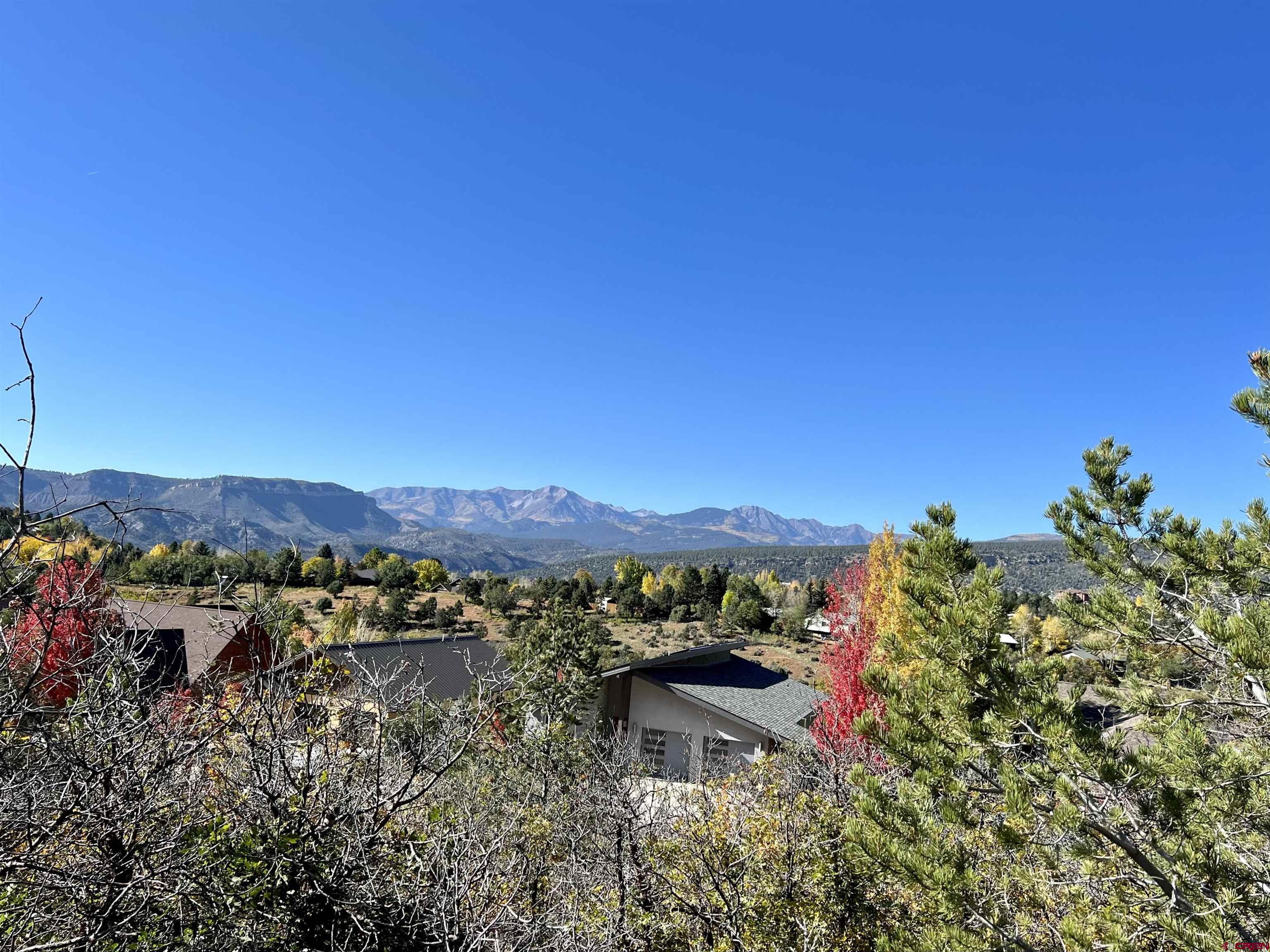 24 Lizard Head Drive Durango, CO 81301 - Photo 10 of 21 a view of a lake with a mountain in the background