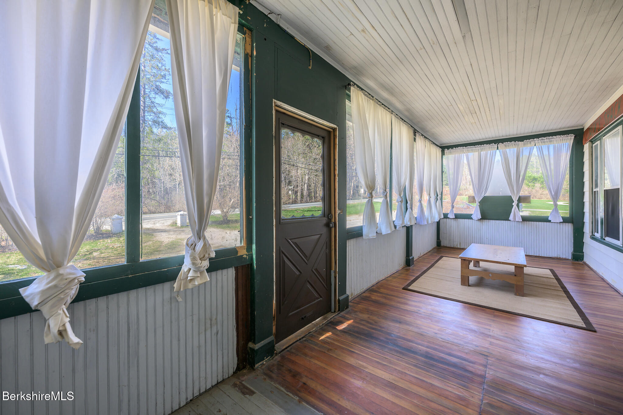 6 East Street Stockbridge, MA 01262 - Photo 3 of 23 a living room with furniture and a window