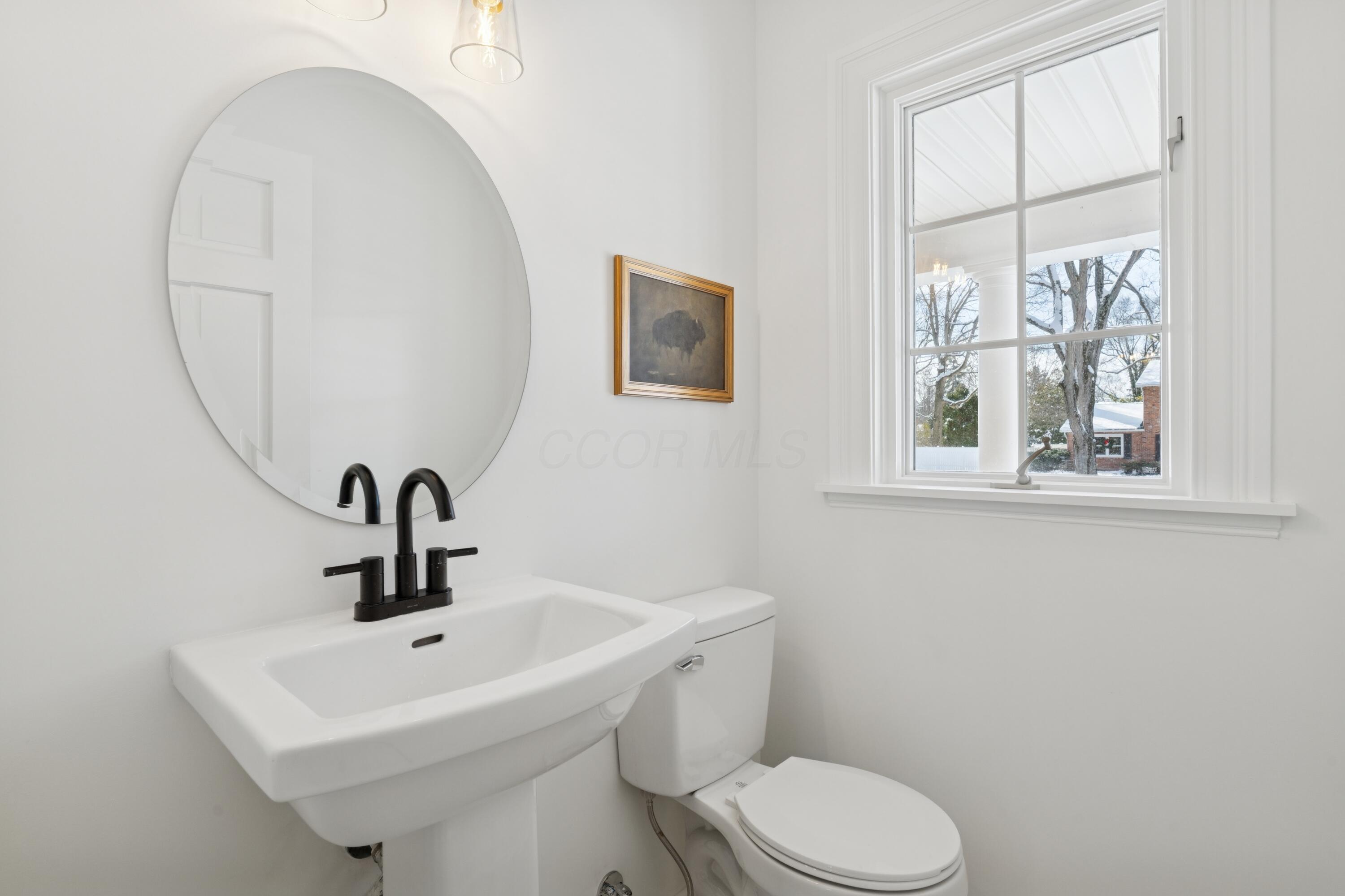 4540 Langport Road Columbus, OH 43220 - Photo 11 of 65 First Floor Half Bathroom