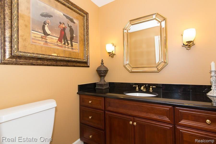 6376 Peach Tree Court Rochester, MI 48306 - Photo 16 of 27 LAV on the 1st Floor. Granite and Premium Cherry