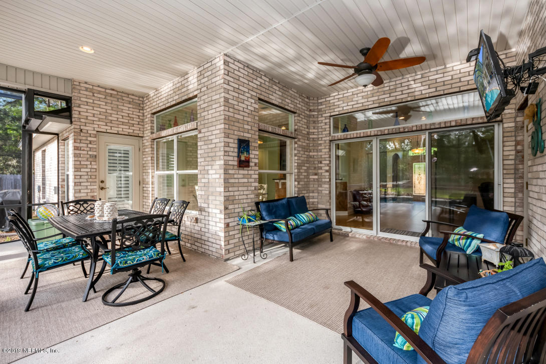 87465 Creekside Drive Yulee, FL 32097 - Photo 26 of 40 a living room with furniture