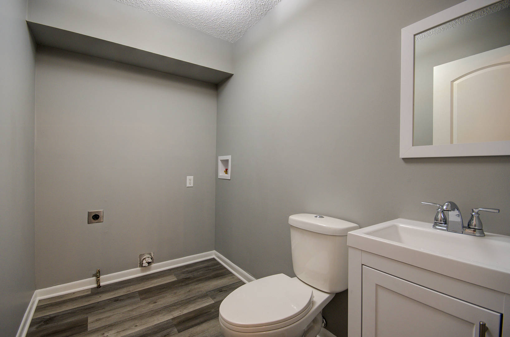 1354 Georgetown Drive Bourbonnais, IL 60914 - Photo 15 of 18 a bathroom with a sink toilet and vanity
