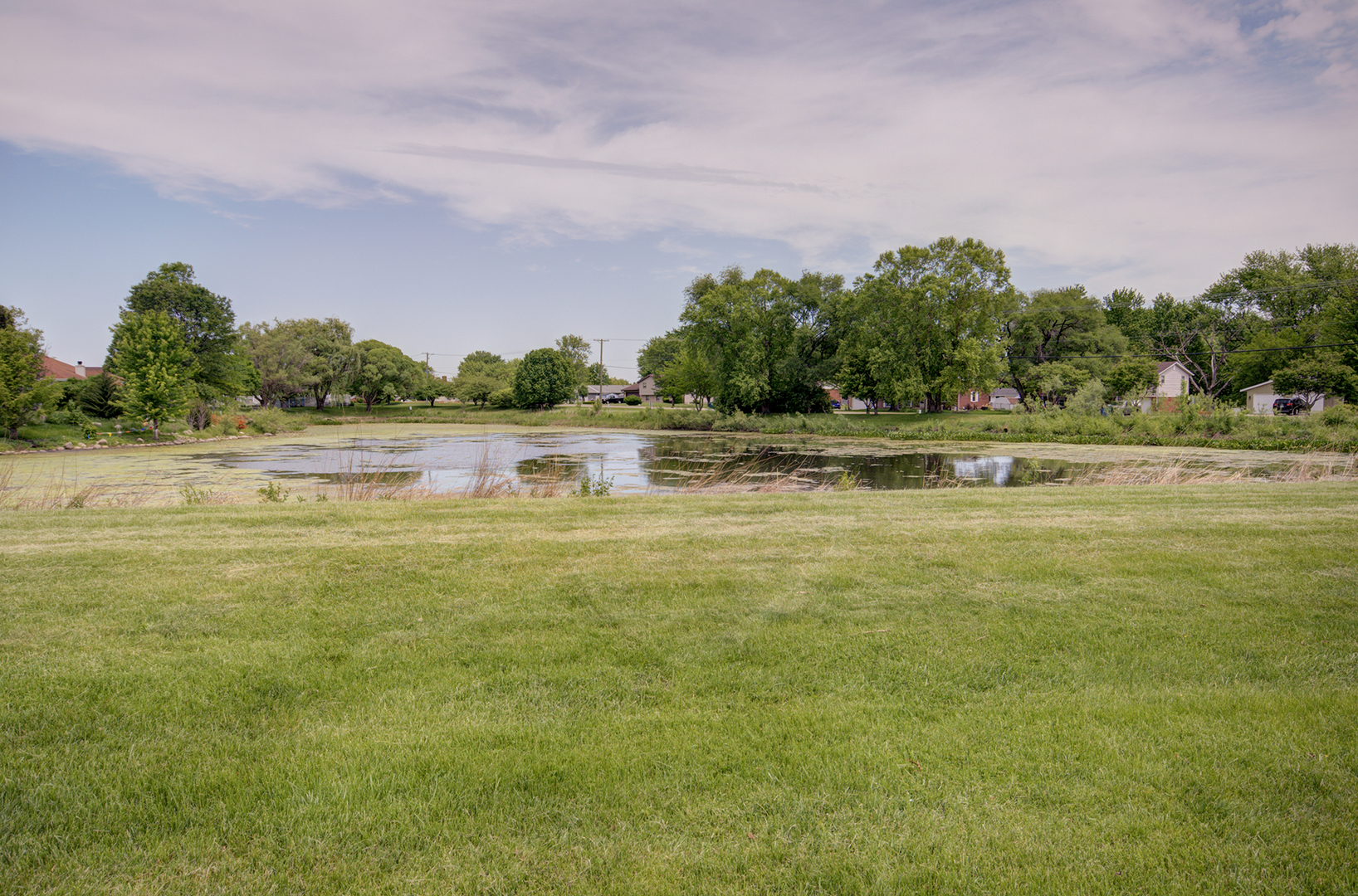 1354 Georgetown Drive Bourbonnais, IL 60914 - Photo 17 of 18 a view of a lake with a big yard