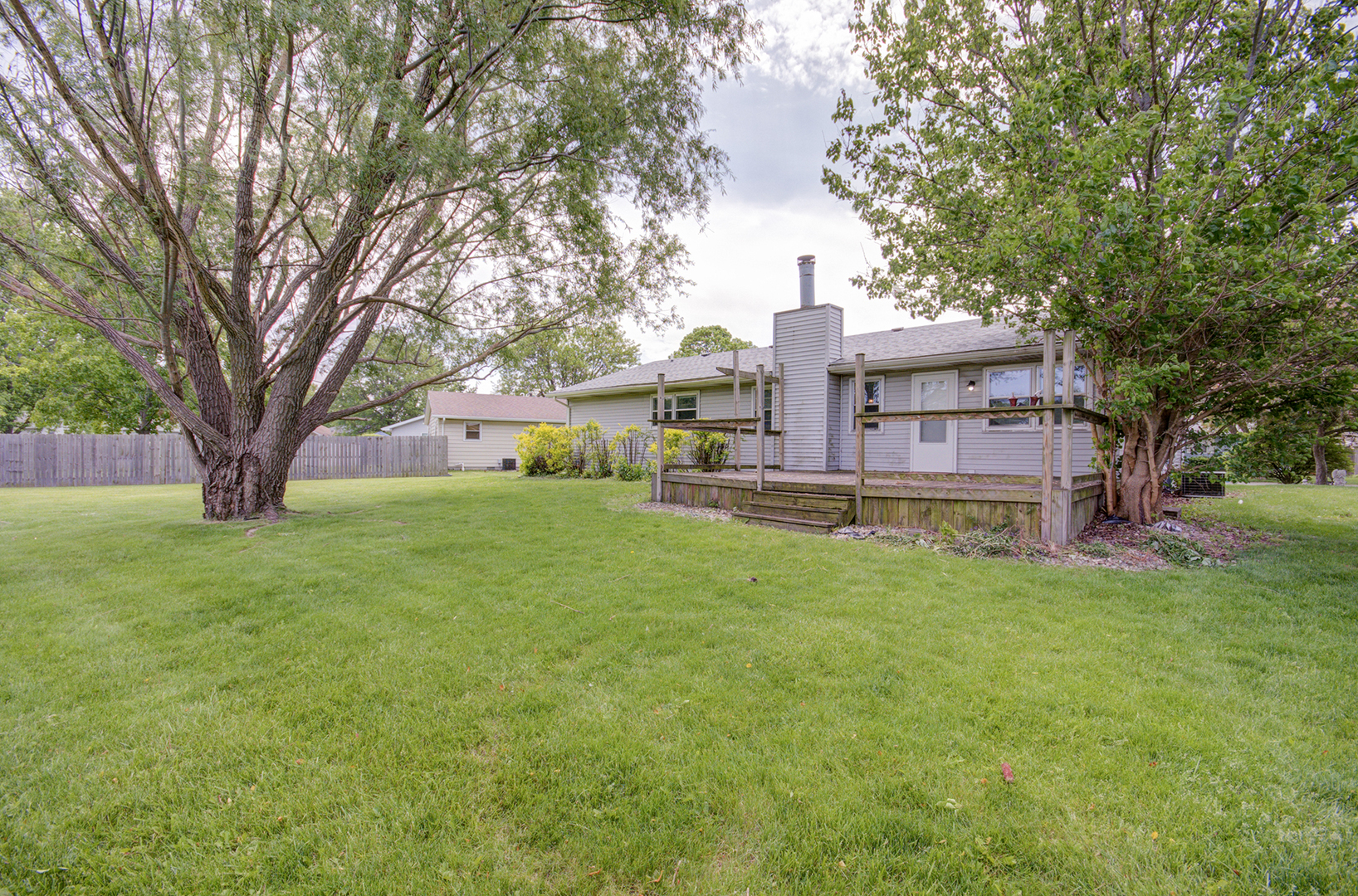 1354 Georgetown Drive Bourbonnais, IL 60914 - Photo 18 of 18 a view of a house with a yard