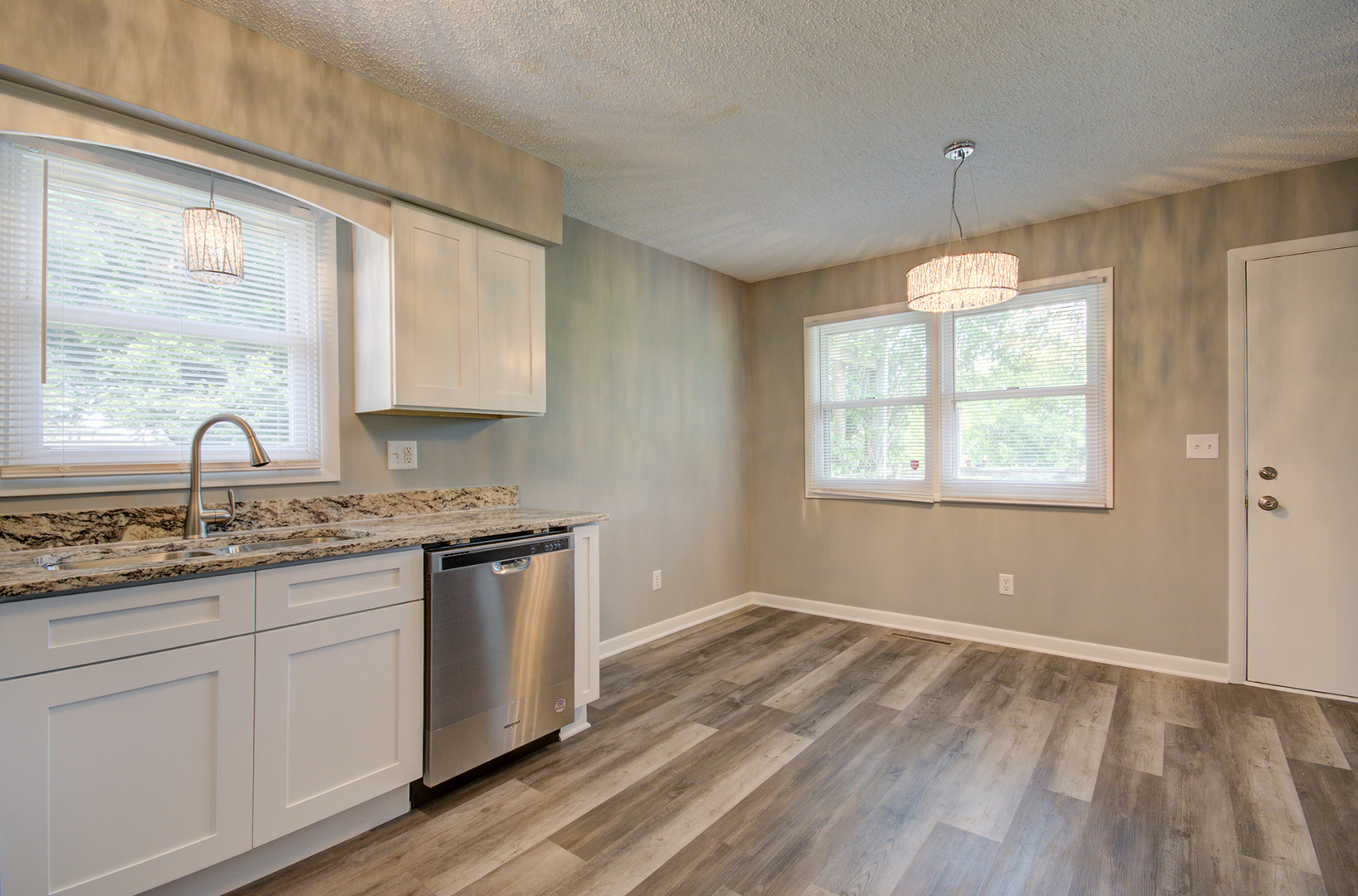 1354 Georgetown Drive Bourbonnais, IL 60914 - Photo 5 of 18 a kitchen with stainless steel appliances granite countertop wooden floors and sink