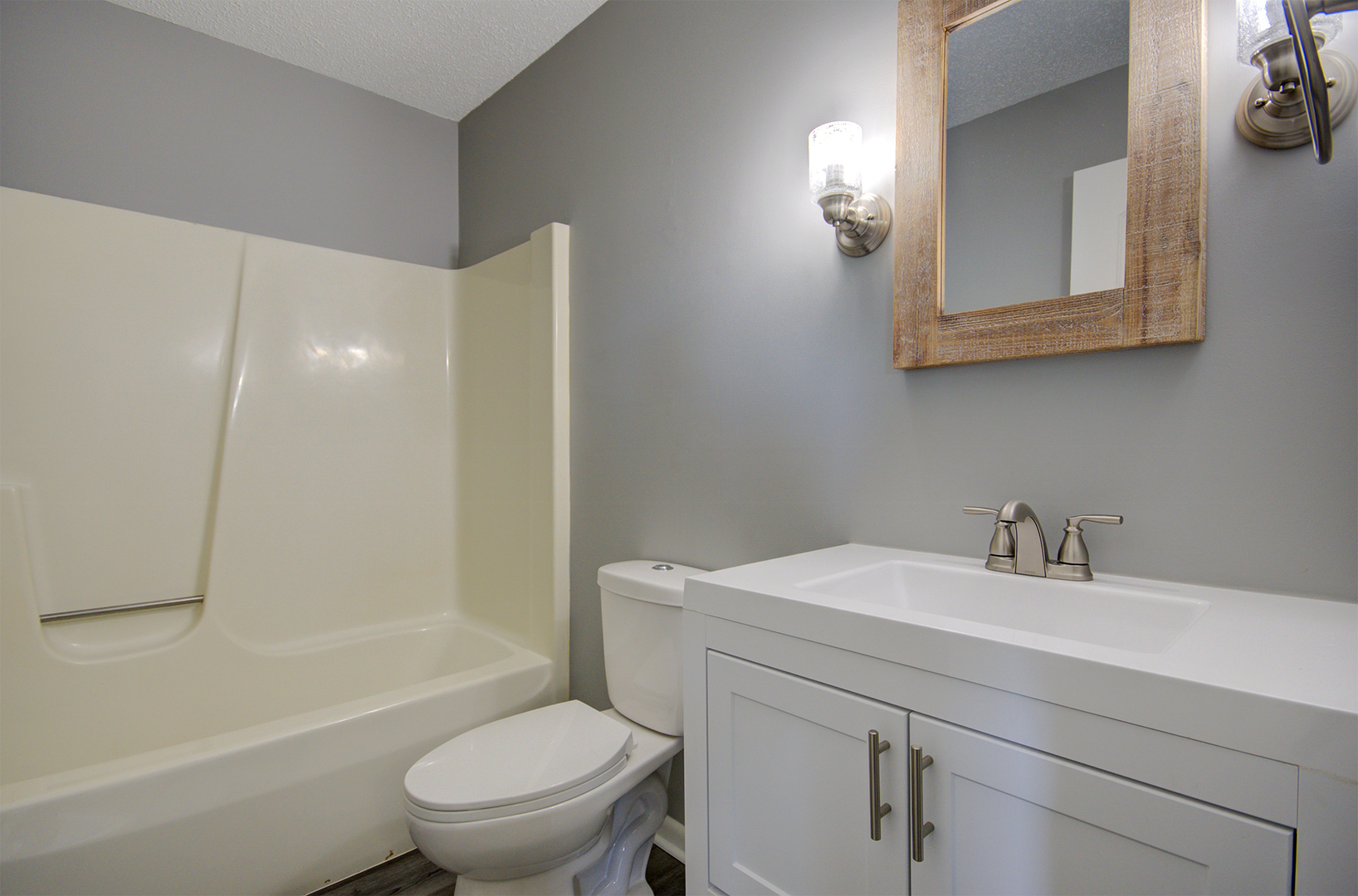 1354 Georgetown Drive Bourbonnais, IL 60914 - Photo 10 of 18 a bathroom with a sink a toilet and shower
