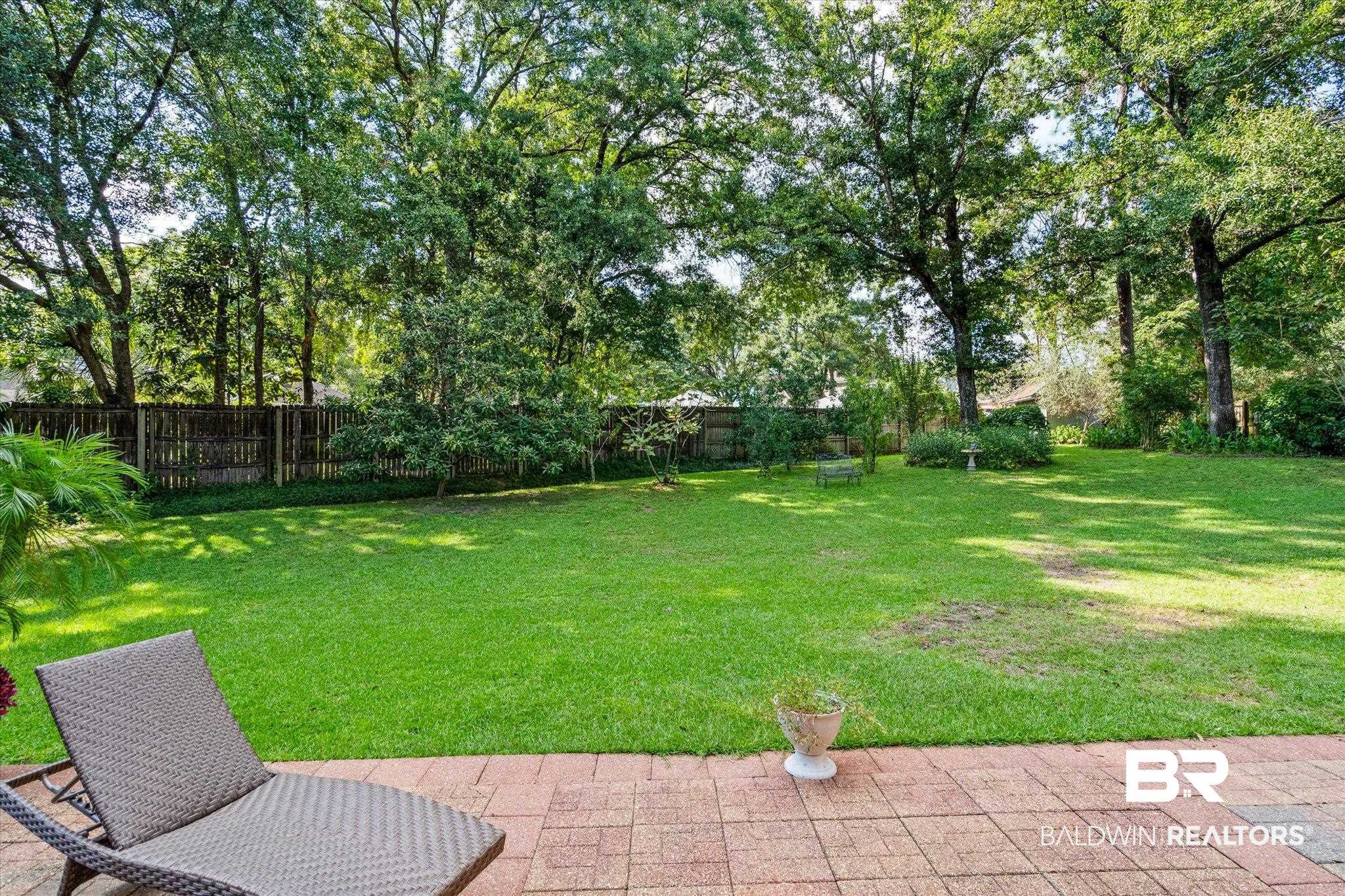 7360 Bridgewood Court Mobile, AL 36695 - Photo 27 of 30 View of yard with a patio
