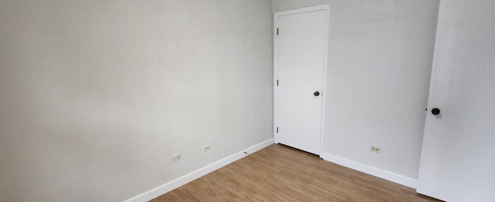 7306 West Mathews Drive Frankfort, IL 60423 - Photo 14 of 26 a view of an empty room with wooden floor