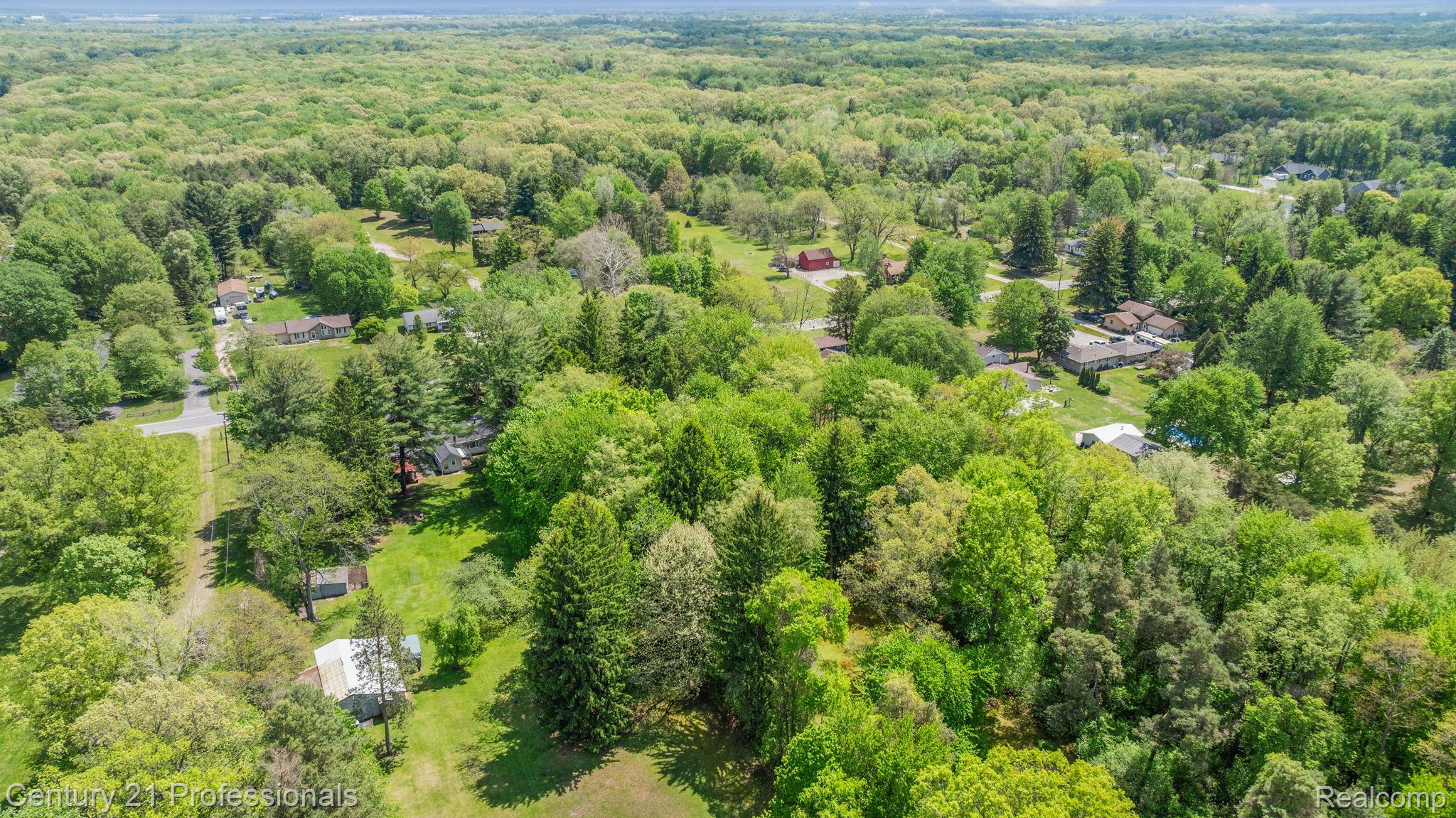 8638 Stone Road Algonac, MI 48001 - Photo 60 of 70 Aerial view of a heavily wooded area