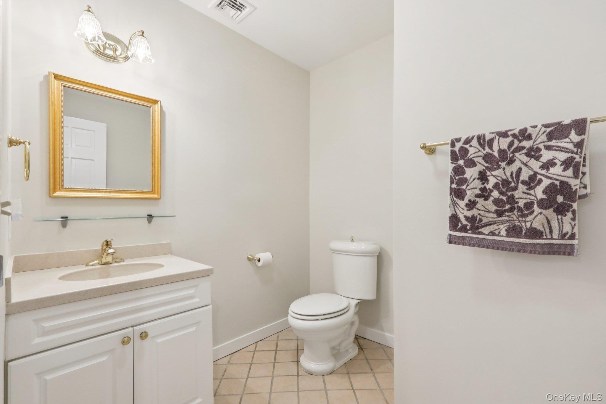 27 Cat Ridge Road North Salem, NY 10560 - Photo 33 of 49 a bathroom with a toilet sink and mirror