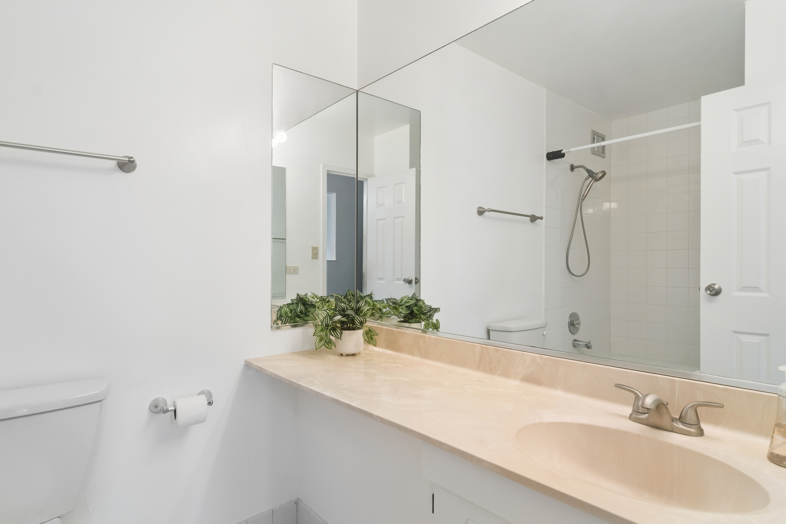 9701 North Dee Road, Unit 6N Niles, IL 60714 - Photo 10 of 13 a bathroom with a sink vanity granite tub and shower