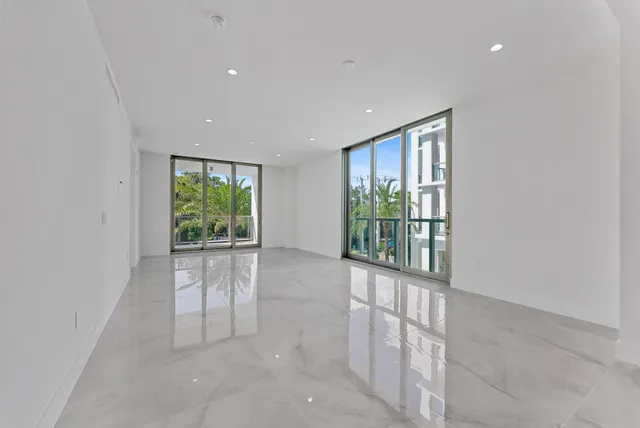 a view of a house with backyard and deck