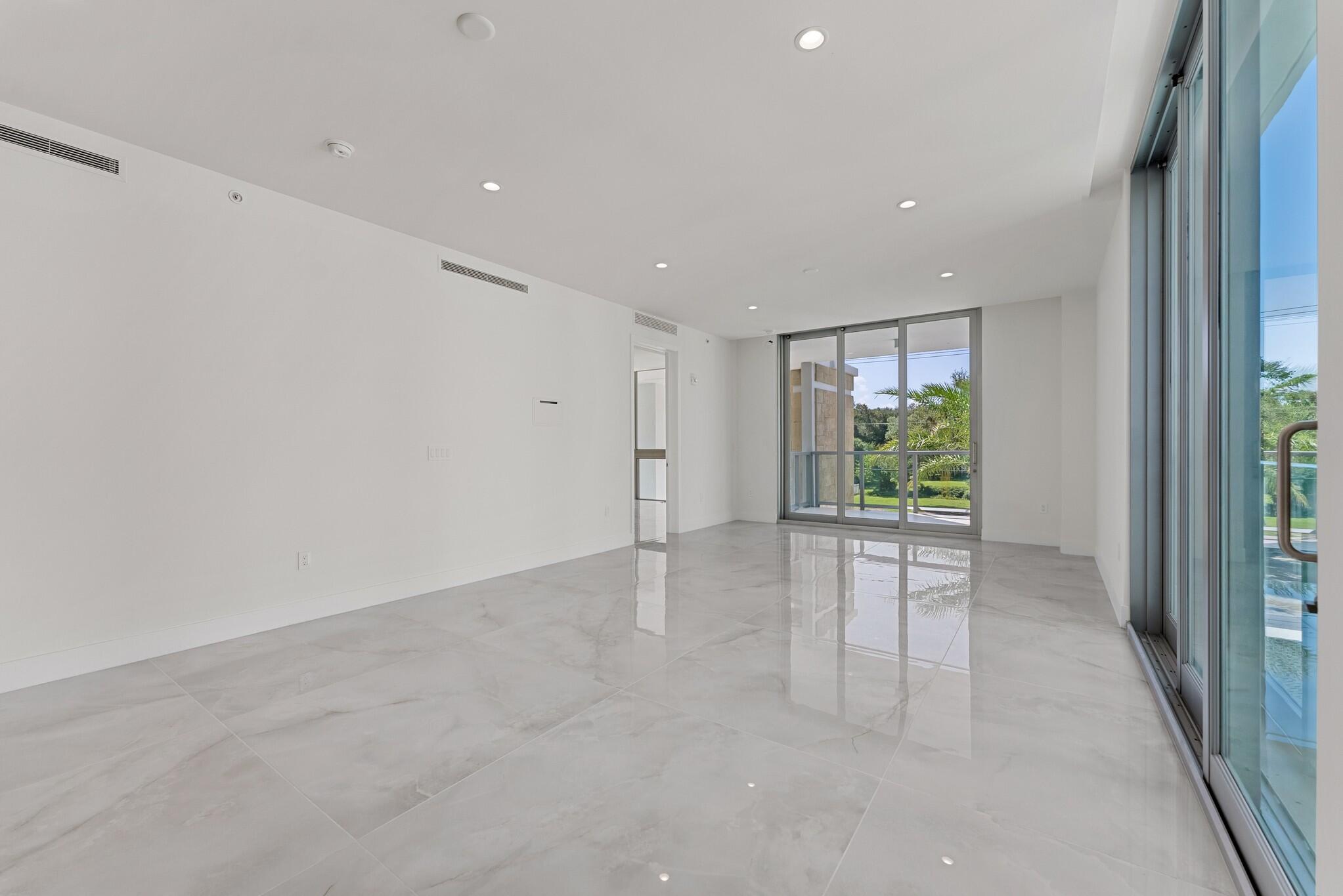 485 East Royal Palm Road, Unit 204 Boca Raton, FL 33432 - Photo 18 of 70 a view of an empty room with a window