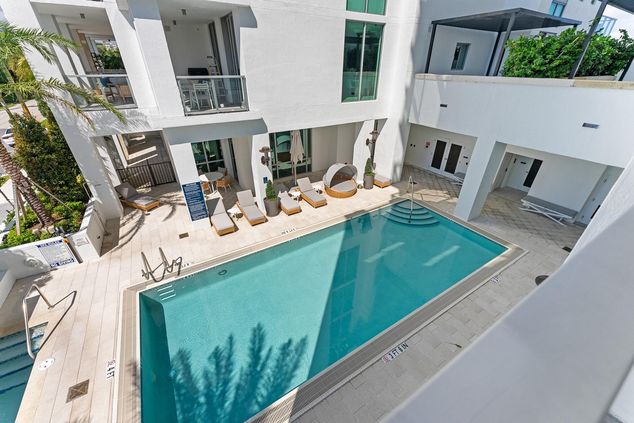 485 East Royal Palm Road, Unit 204 Boca Raton, FL 33432 - Photo 23 of 70 a view of a house with backyard and deck