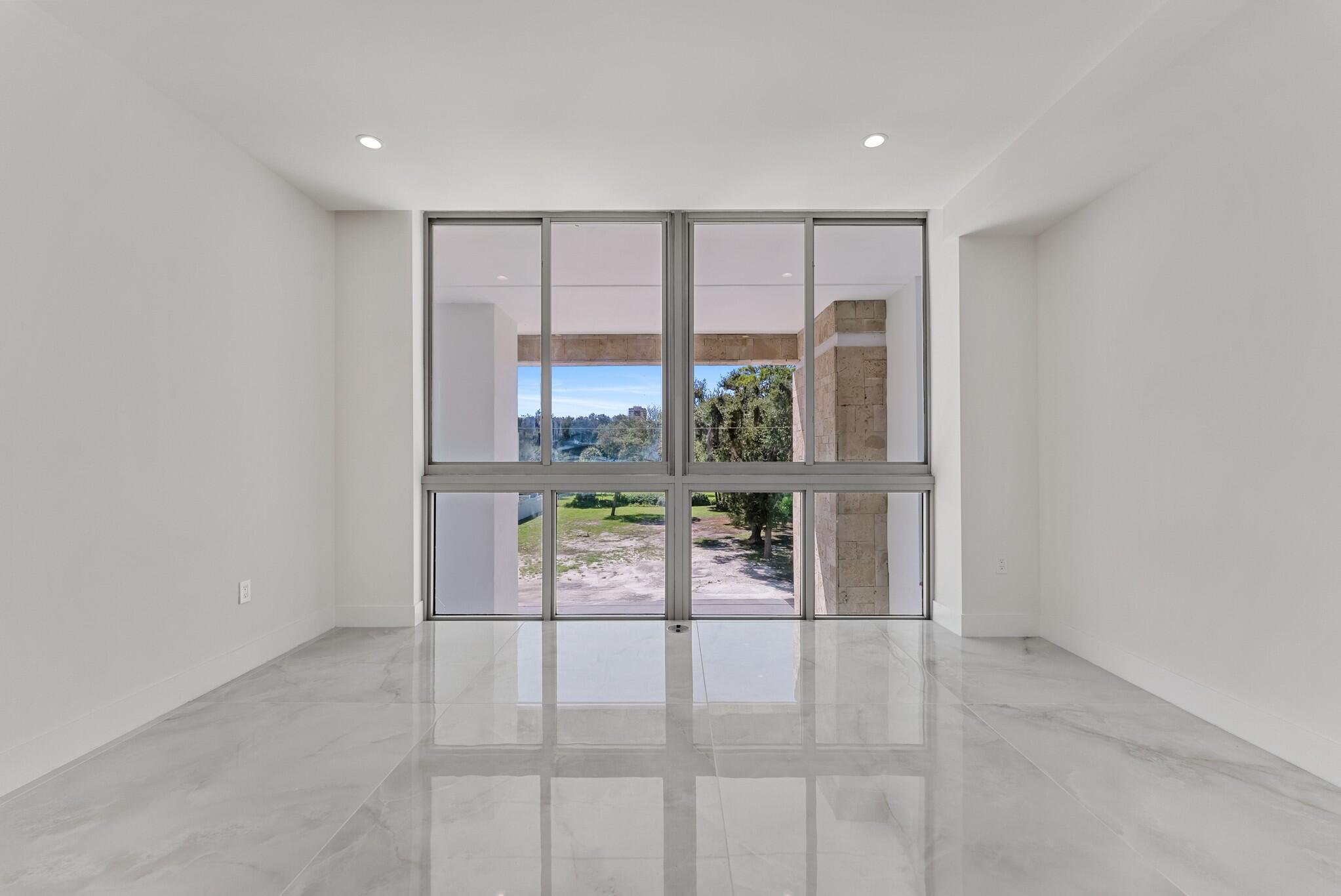 485 East Royal Palm Road, Unit 204 Boca Raton, FL 33432 - Photo 27 of 70 a view of an empty room with a window