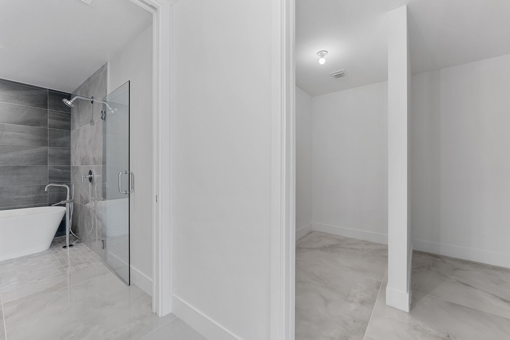 485 East Royal Palm Road, Unit 204 Boca Raton, FL 33432 - Photo 32 of 70 a bathroom with a sink a toilet and shower