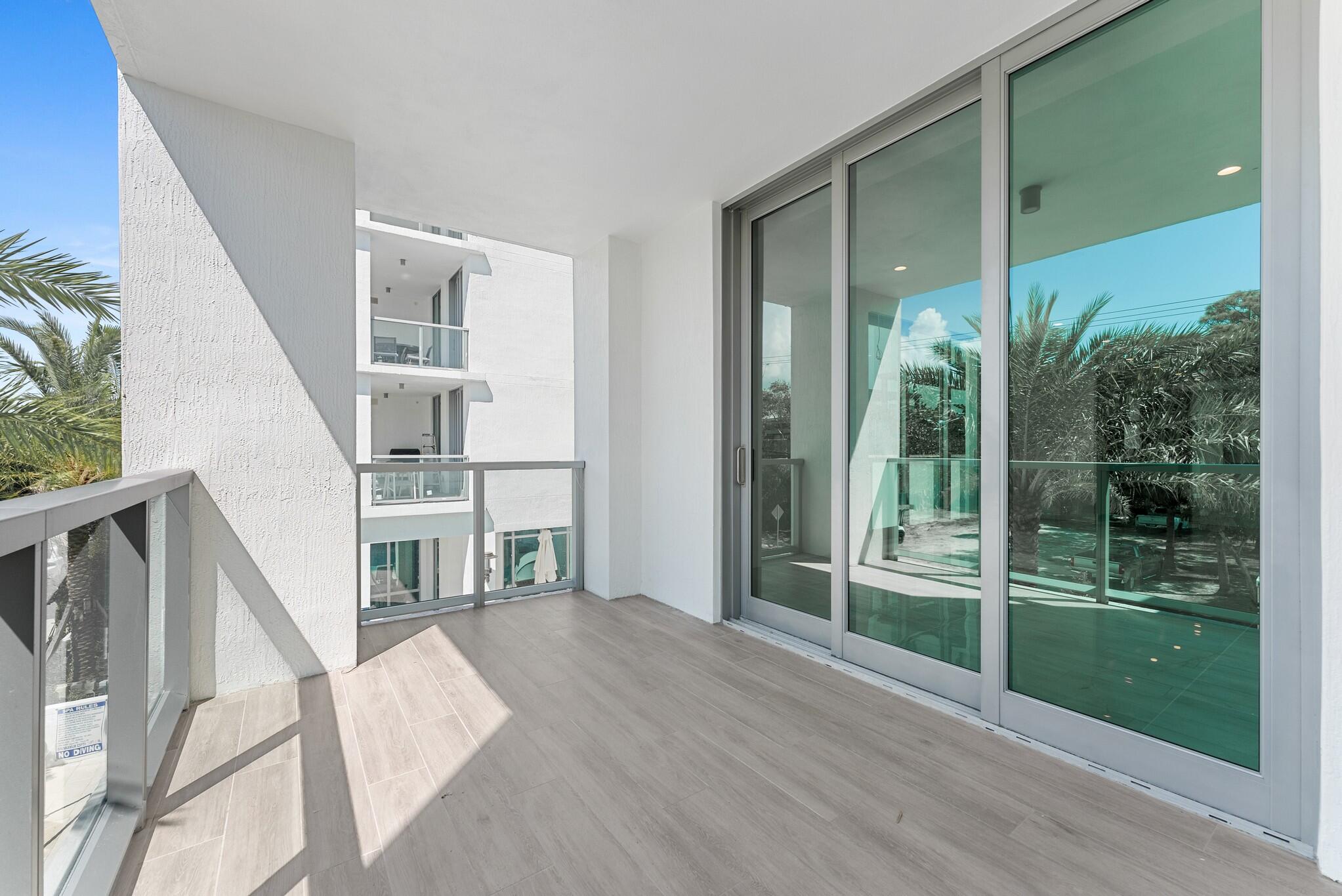 485 East Royal Palm Road, Unit 204 Boca Raton, FL 33432 - Photo 33 of 70 a view of entryway and hall with wooden floor