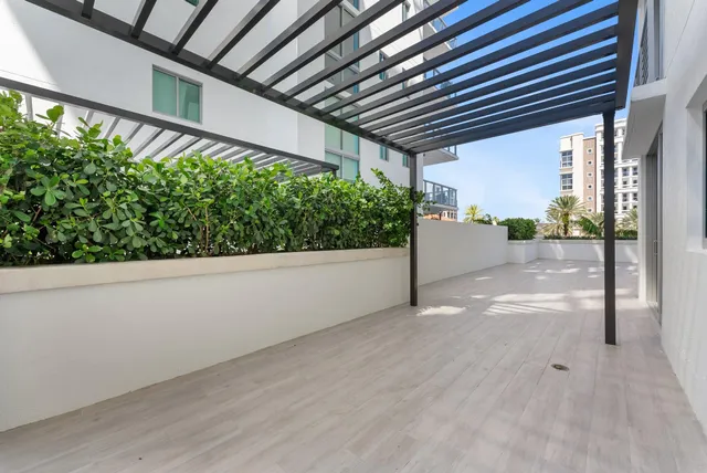 a view of walk in closet and window