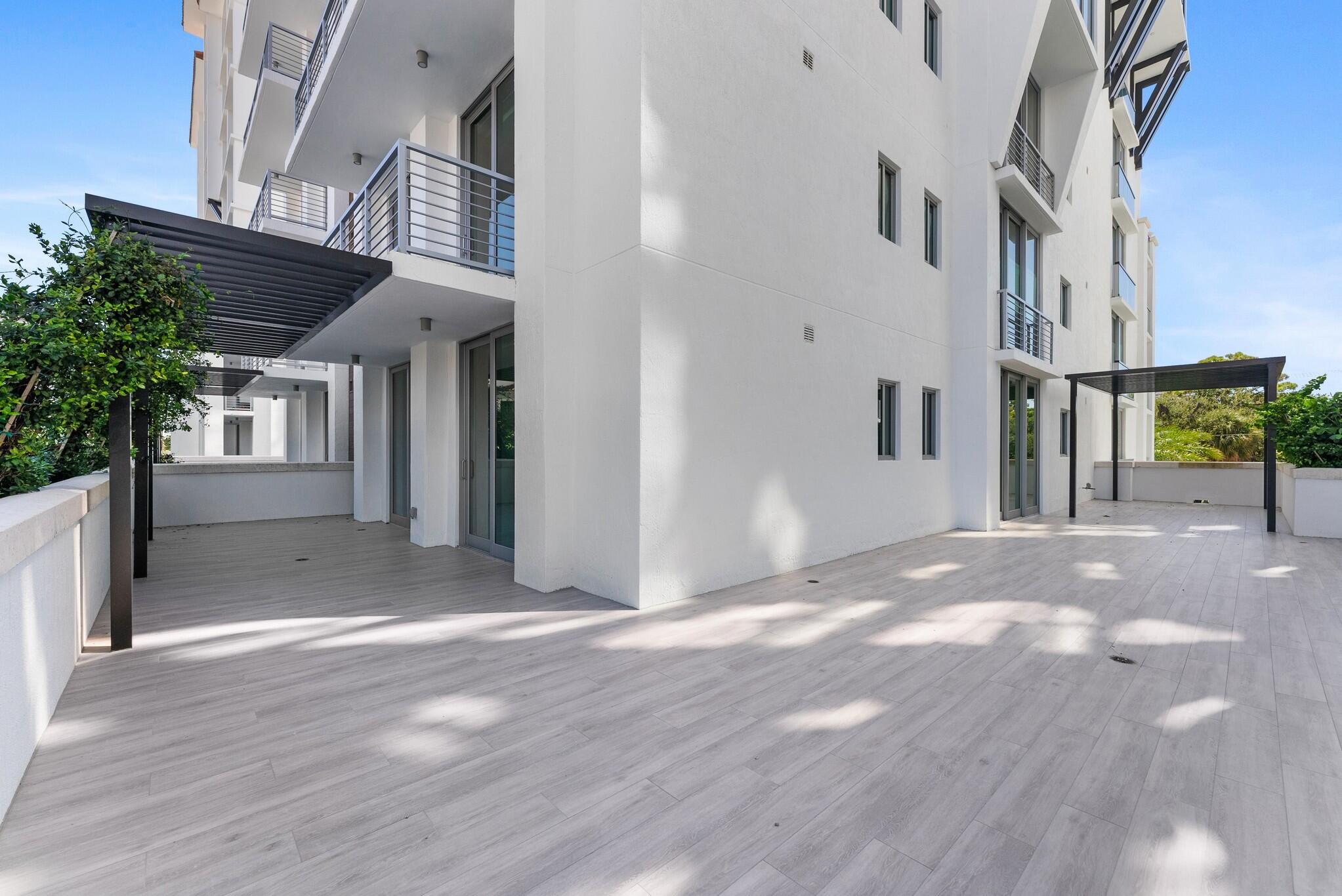 485 East Royal Palm Road, Unit 204 Boca Raton, FL 33432 - Photo 43 of 70 a view of a house with a backyard