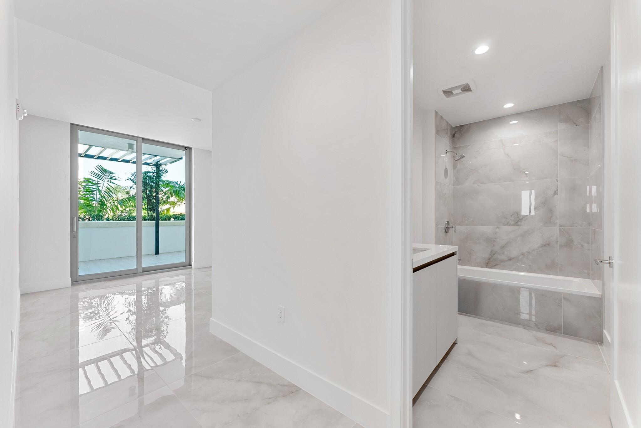 485 East Royal Palm Road, Unit 204 Boca Raton, FL 33432 - Photo 47 of 70 a view of bathroom with bathtub and shower