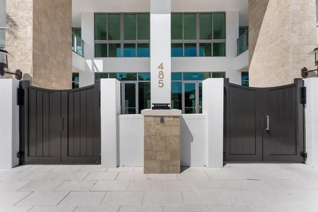 a kitchen with stainless steel appliances a refrigerator sink and stove