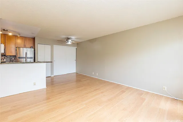 a view of a kitchen with a sink