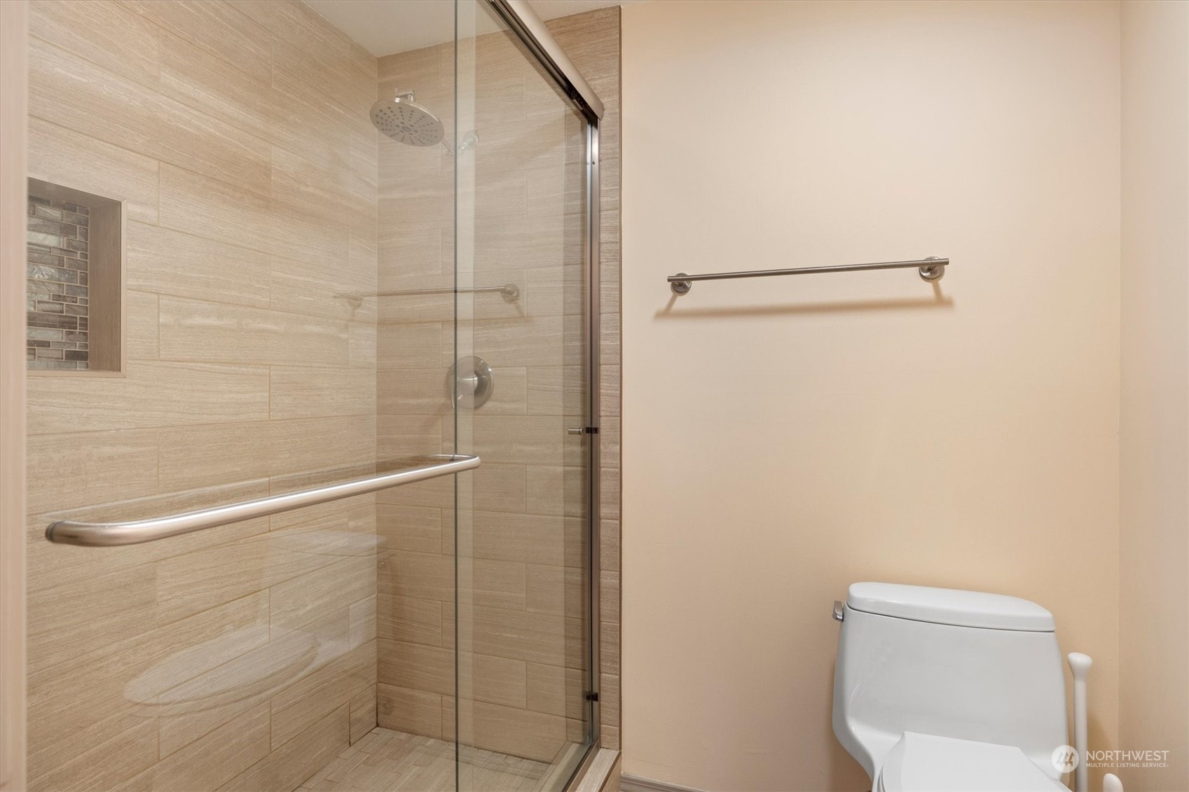 201 3rd Avenue North, Unit 102 Edmonds, WA 98020 - Photo 20 of 39 a bathroom with a shower and toilet