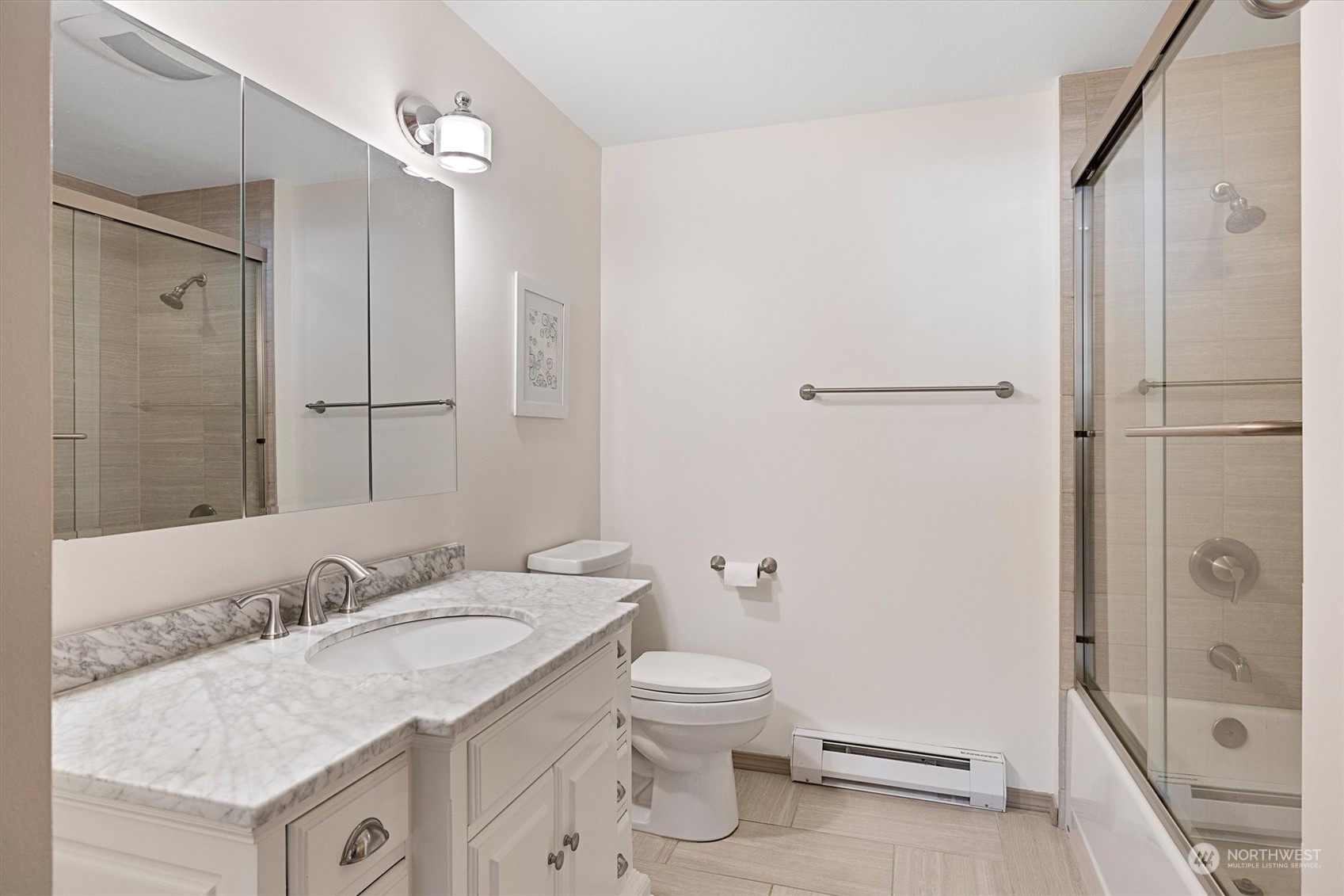 201 3rd Avenue North, Unit 102 Edmonds, WA 98020 - Photo 23 of 39 a bathroom with a granite countertop sink toilet and shower