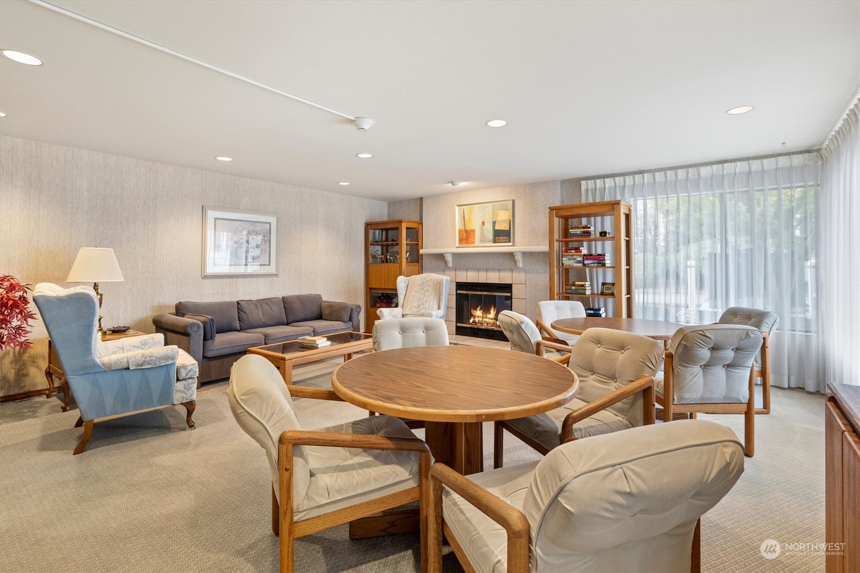 201 3rd Avenue North, Unit 102 Edmonds, WA 98020 - Photo 29 of 39 a living room with furniture and a fireplace