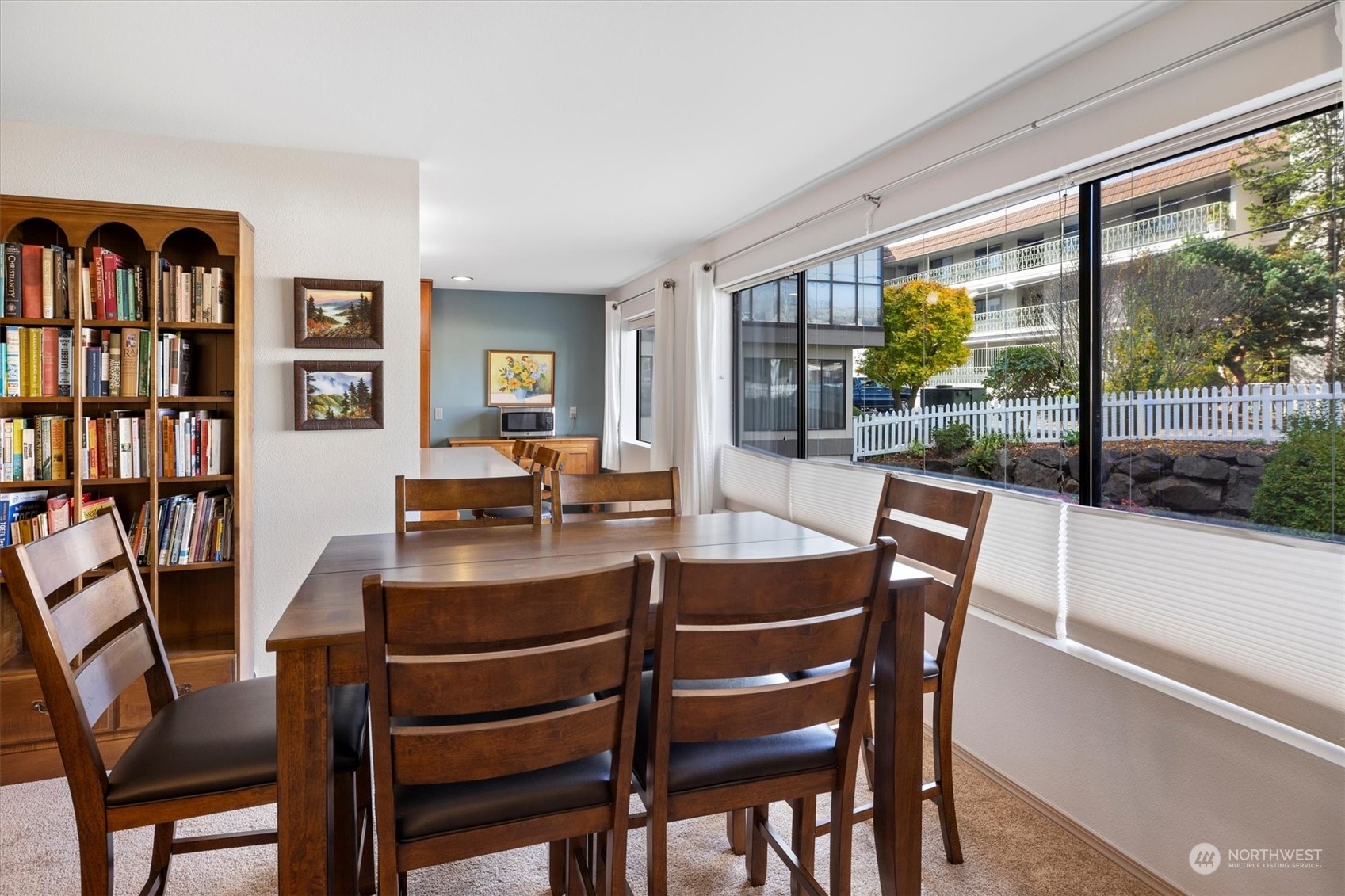 201 3rd Avenue North, Unit 102 Edmonds, WA 98020 - Photo 10 of 39 a view of a dining room with furniture window and outside view