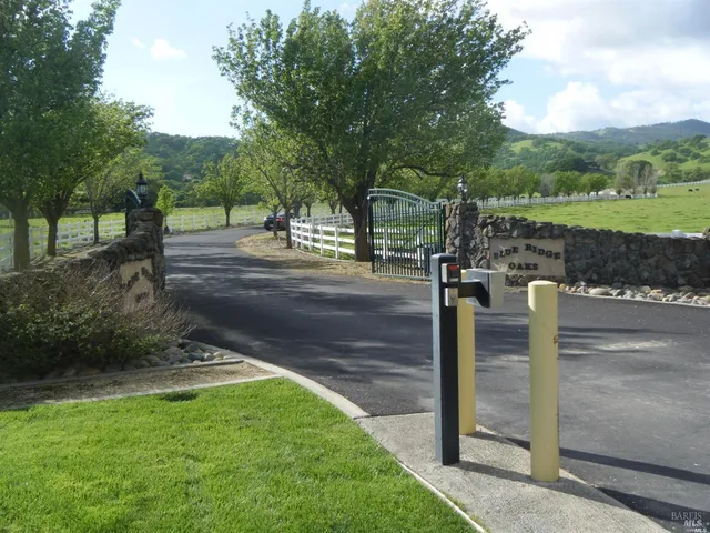 a sign board with yard