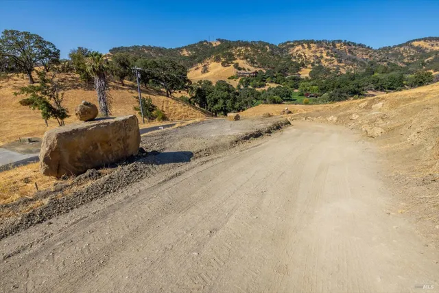 a view of ocean with mountain