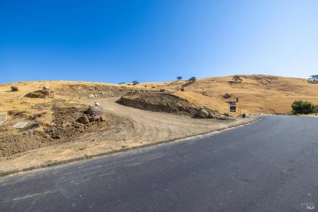 a view of mountain with sunset view