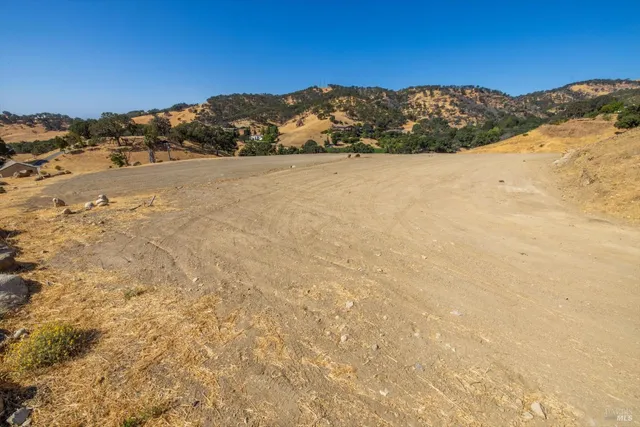 a view of a road with an ocean view