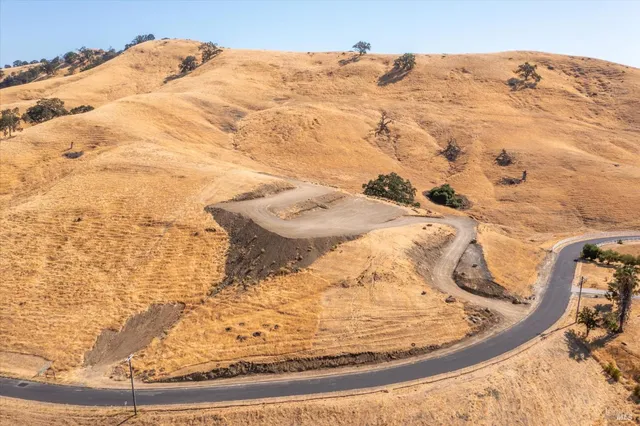 a view of balcony with furniture