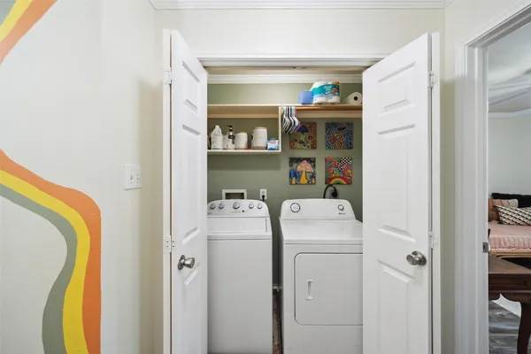 a utility room with dryer and washer