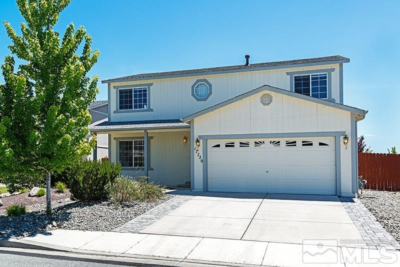 a view of entrance gate of a house