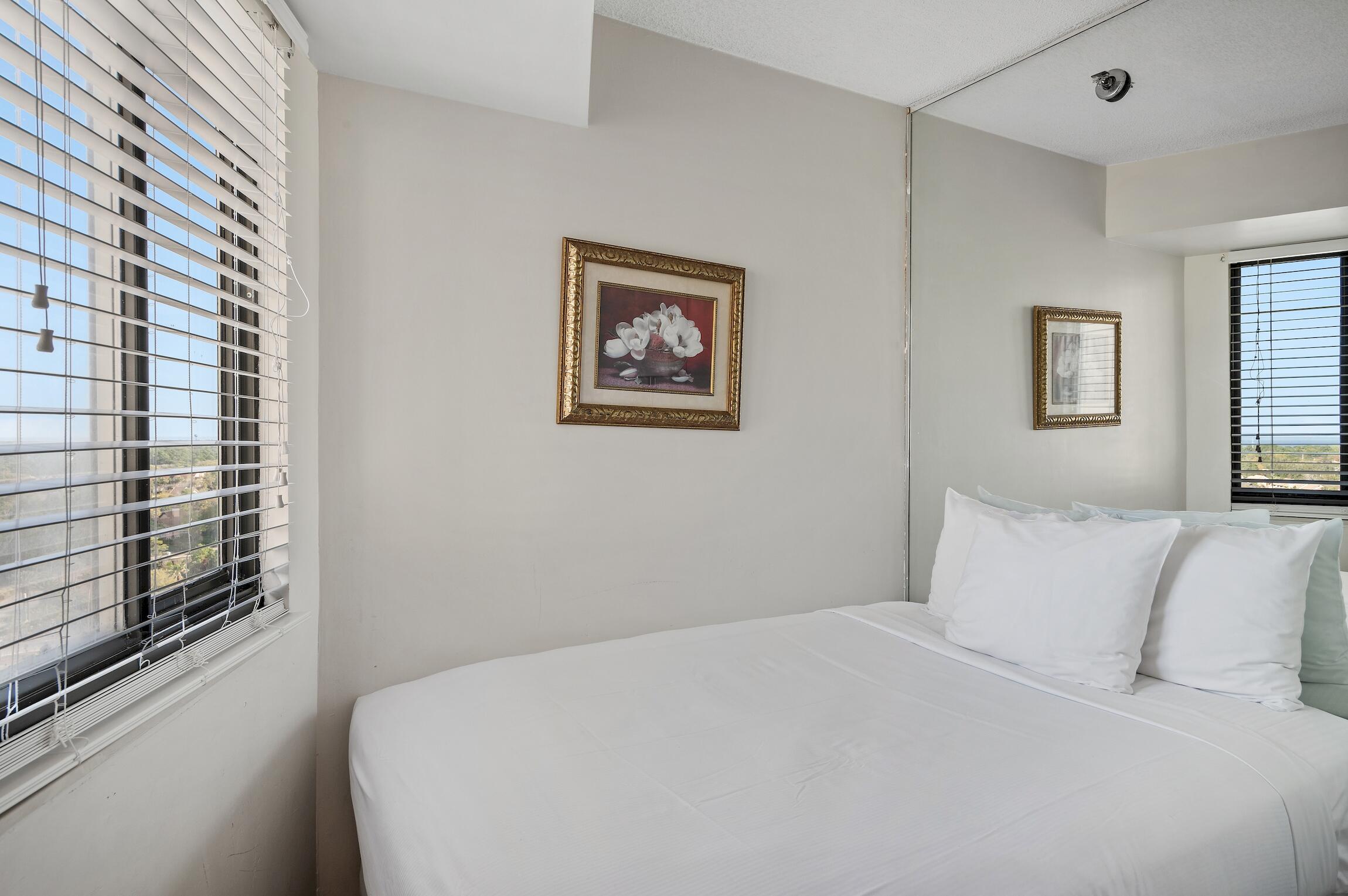4361 Beachside 2, Unit 361 Miramar Beach, FL 32550 - Photo 18 of 29 a bedroom with a bed and a window