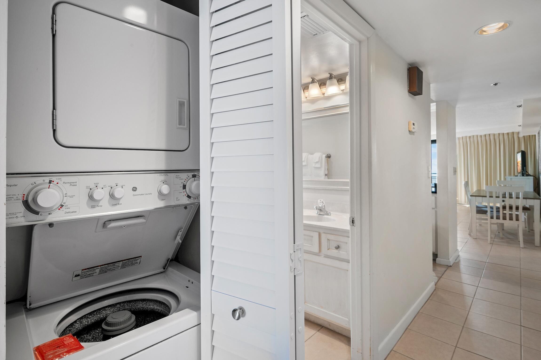 4361 Beachside 2, Unit 361 Miramar Beach, FL 32550 - Photo 19 of 29 a utility room with dryer and washer