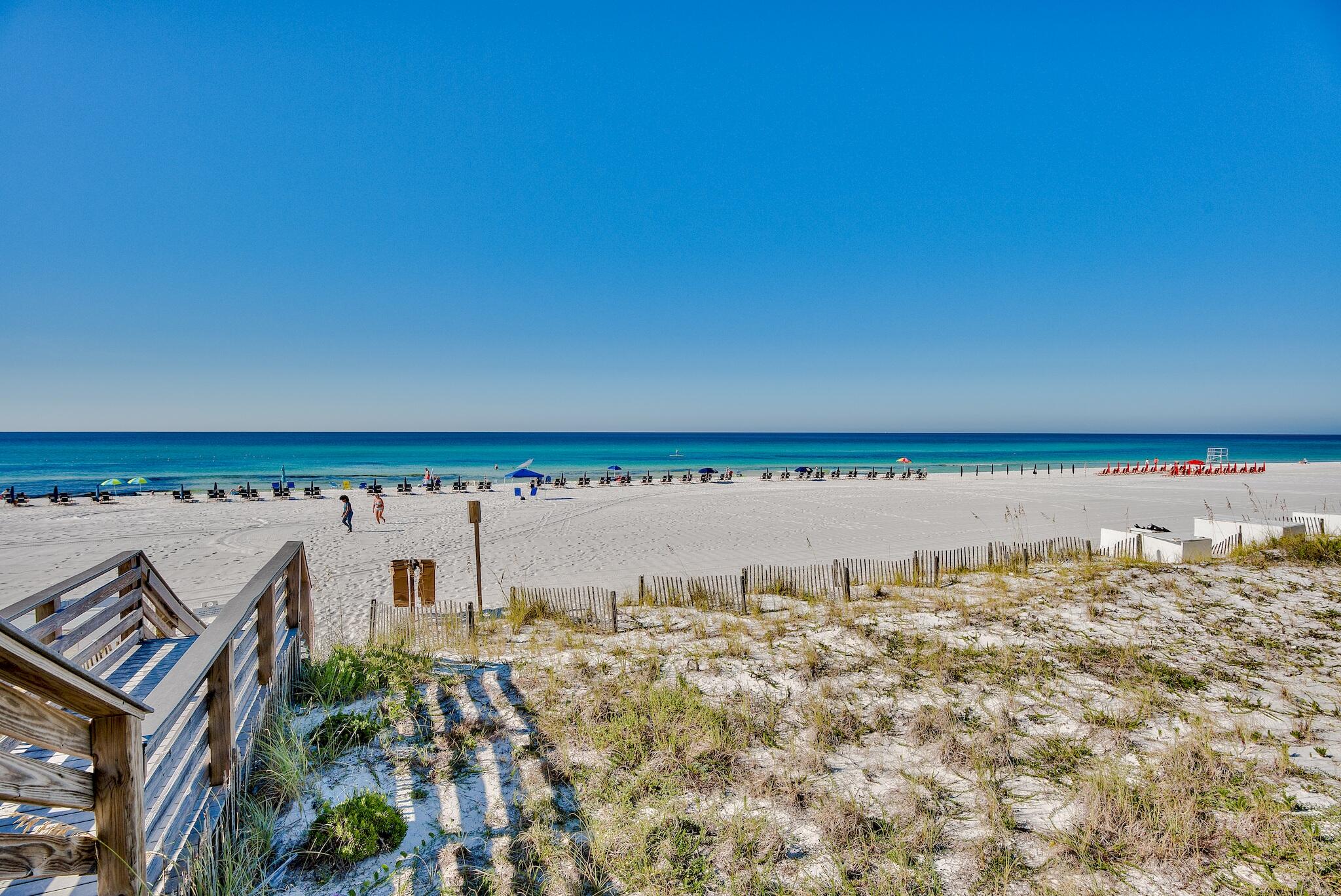 4361 Beachside 2, Unit 361 Miramar Beach, FL 32550 - Photo 27 of 29 a view of a large body of water with a building in the background