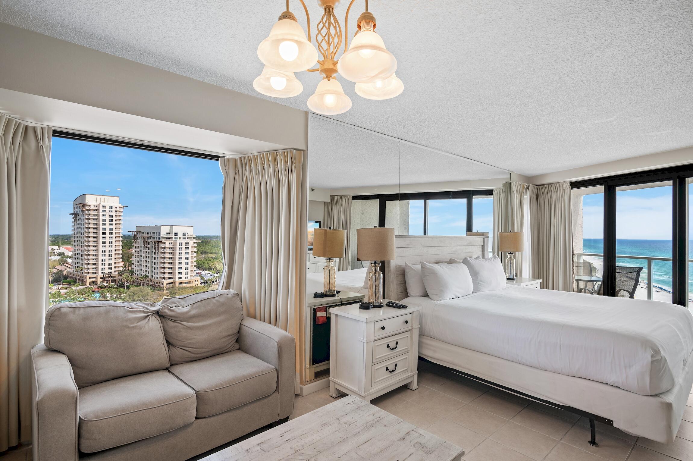 4361 Beachside 2, Unit 361 Miramar Beach, FL 32550 - Photo 10 of 29 a bedroom with bed and large windows