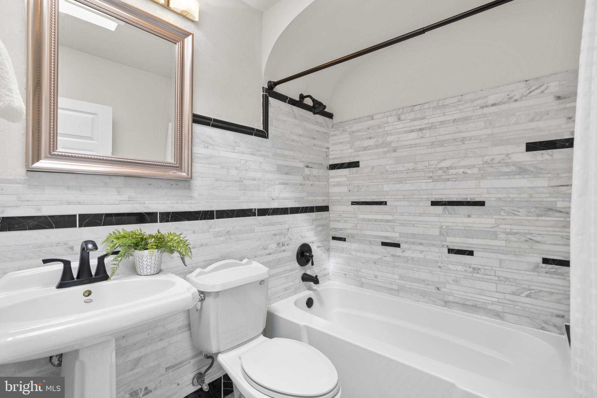 106 Cherrydell Road Baltimore, MD 21228 - Photo 25 of 50 Updated hall bathroom with tub shower