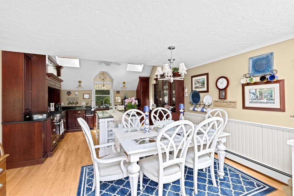 39 High Beacon Way Marshfield, MA 02050 - Photo 11 of 23 a view of a dining room with furniture and chandelier