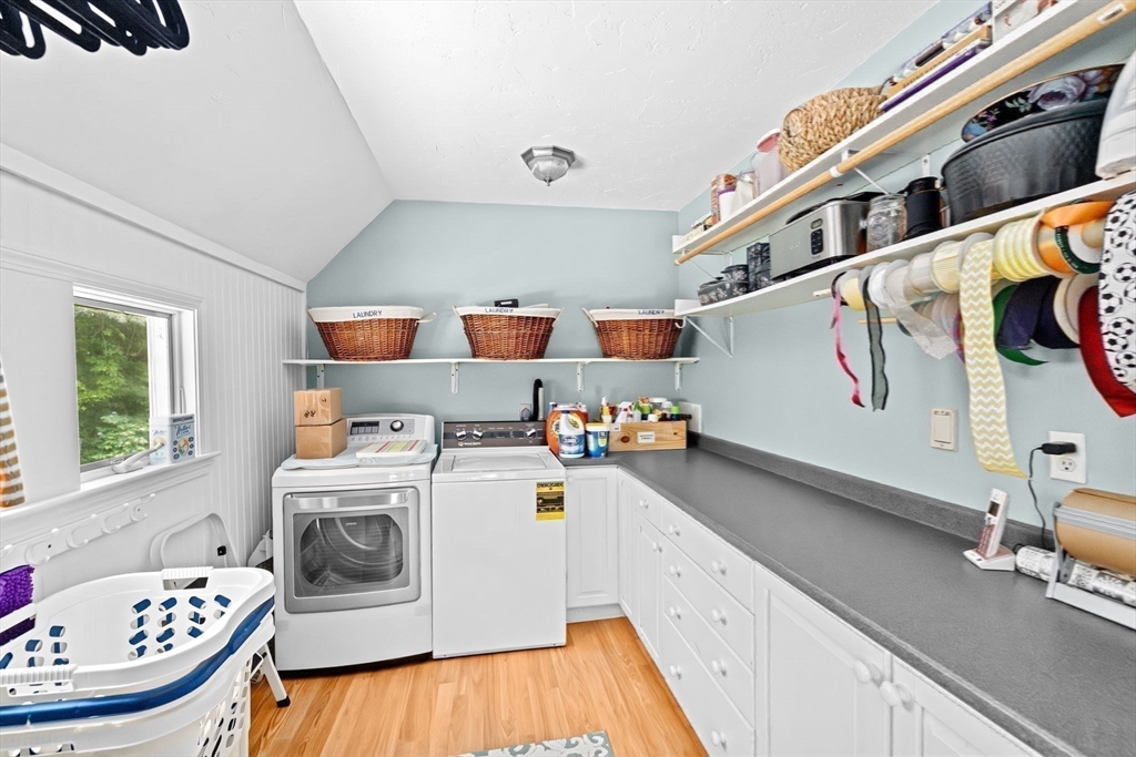 39 High Beacon Way Marshfield, MA 02050 - Photo 18 of 23 a storage room with washer and dryer