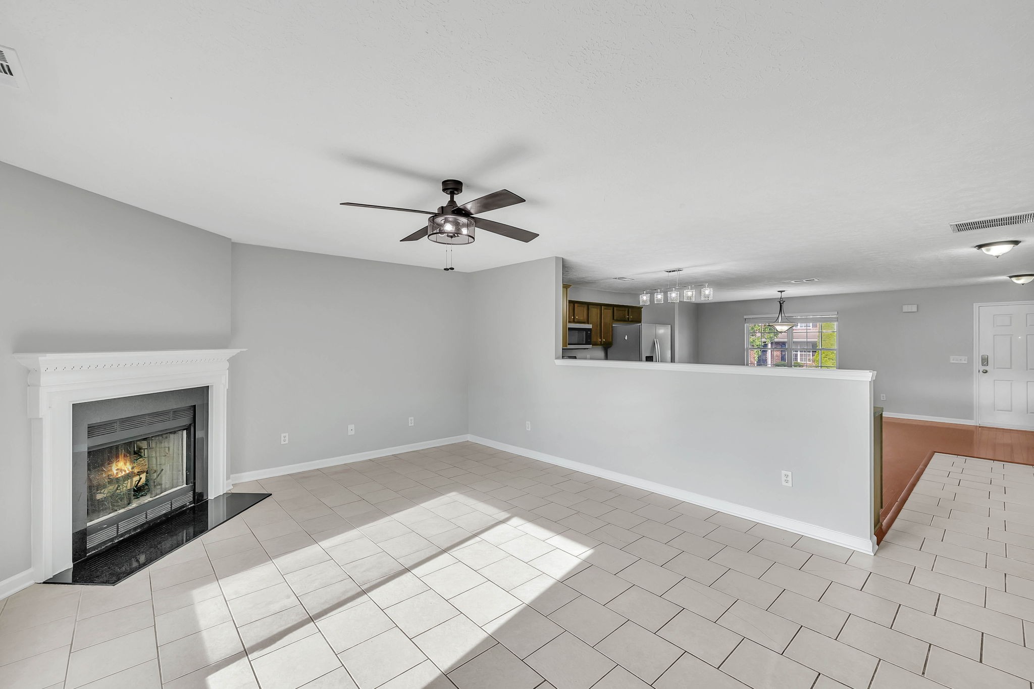 3418 Blaze Drive Murfreesboro, TN 37128 - Photo 14 of 46 a view of an empty room and a kitchen