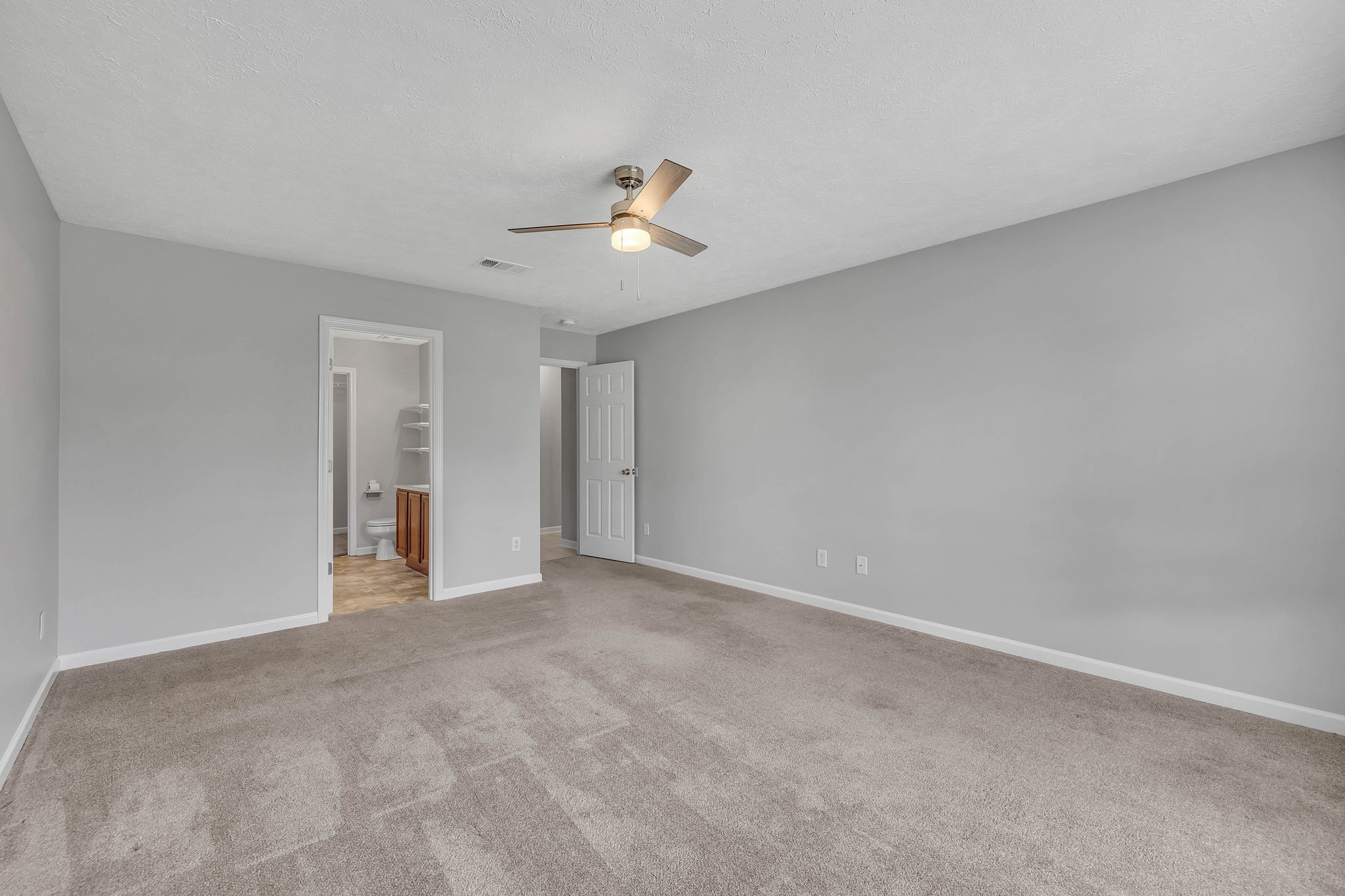 3418 Blaze Drive Murfreesboro, TN 37128 - Photo 19 of 46 a view of an empty room with a ceiling fan
