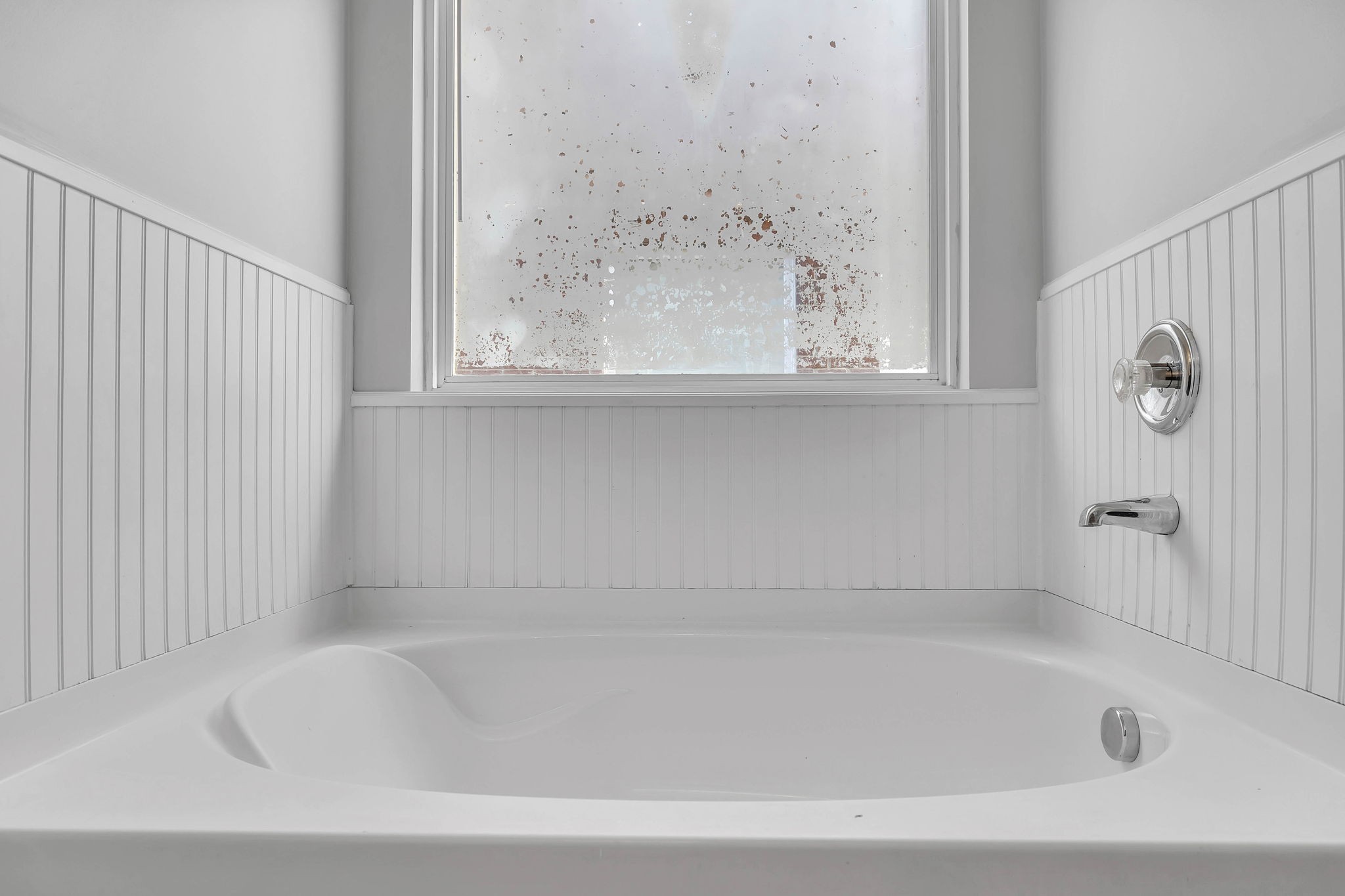 3418 Blaze Drive Murfreesboro, TN 37128 - Photo 23 of 46 a bathroom with bathtub and window